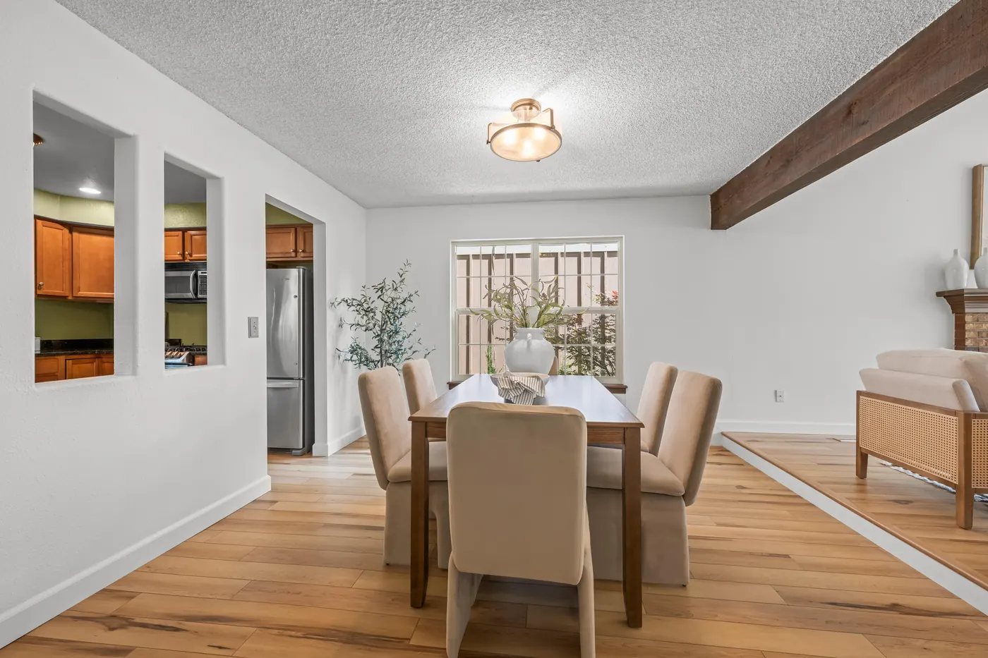Dining area with pass-through to the updated kitchen