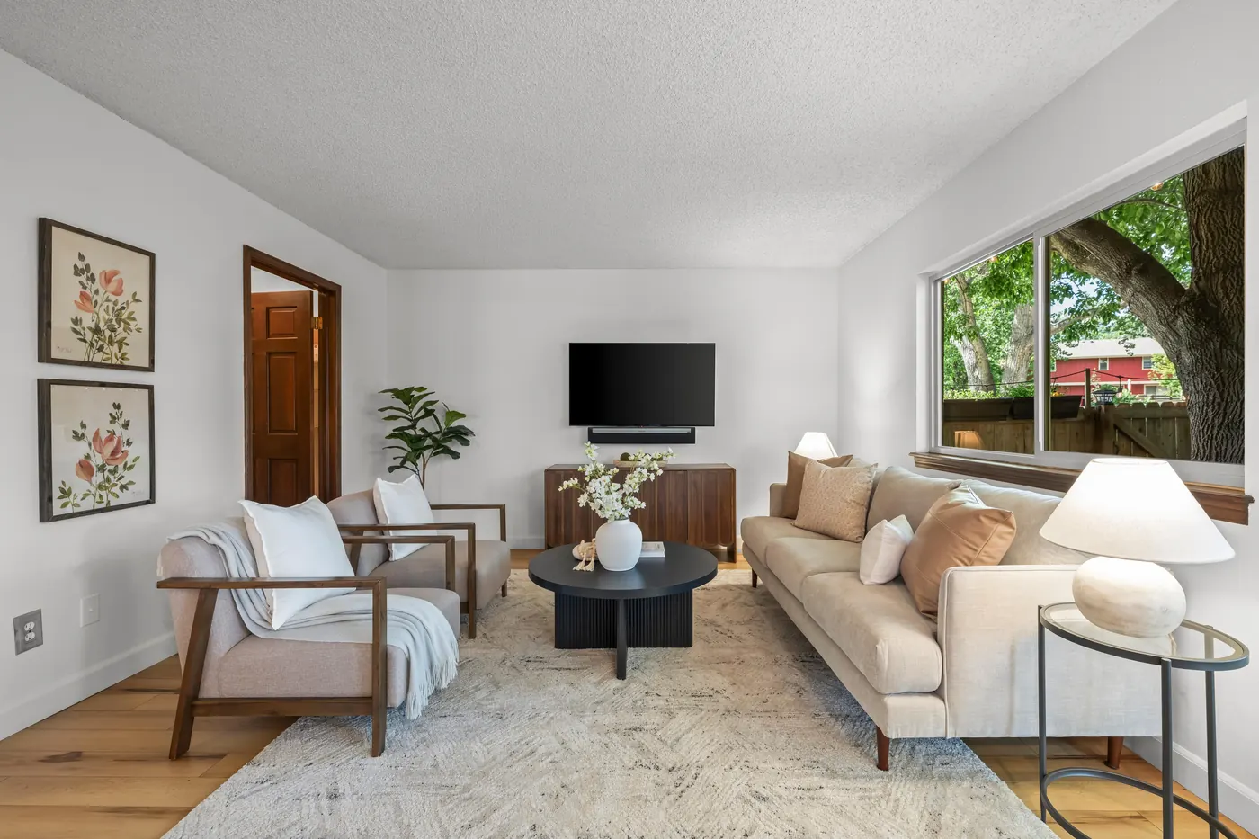 Family room off the kitchen with windows overlooking the backyard
