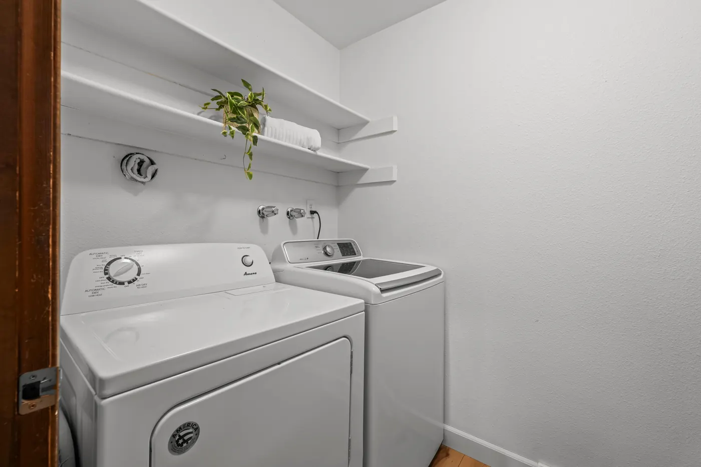 Main-floor laundry with the included washer and dryer