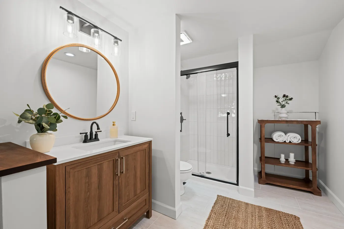 Fully remodeled primary ensuite bath with glass shower