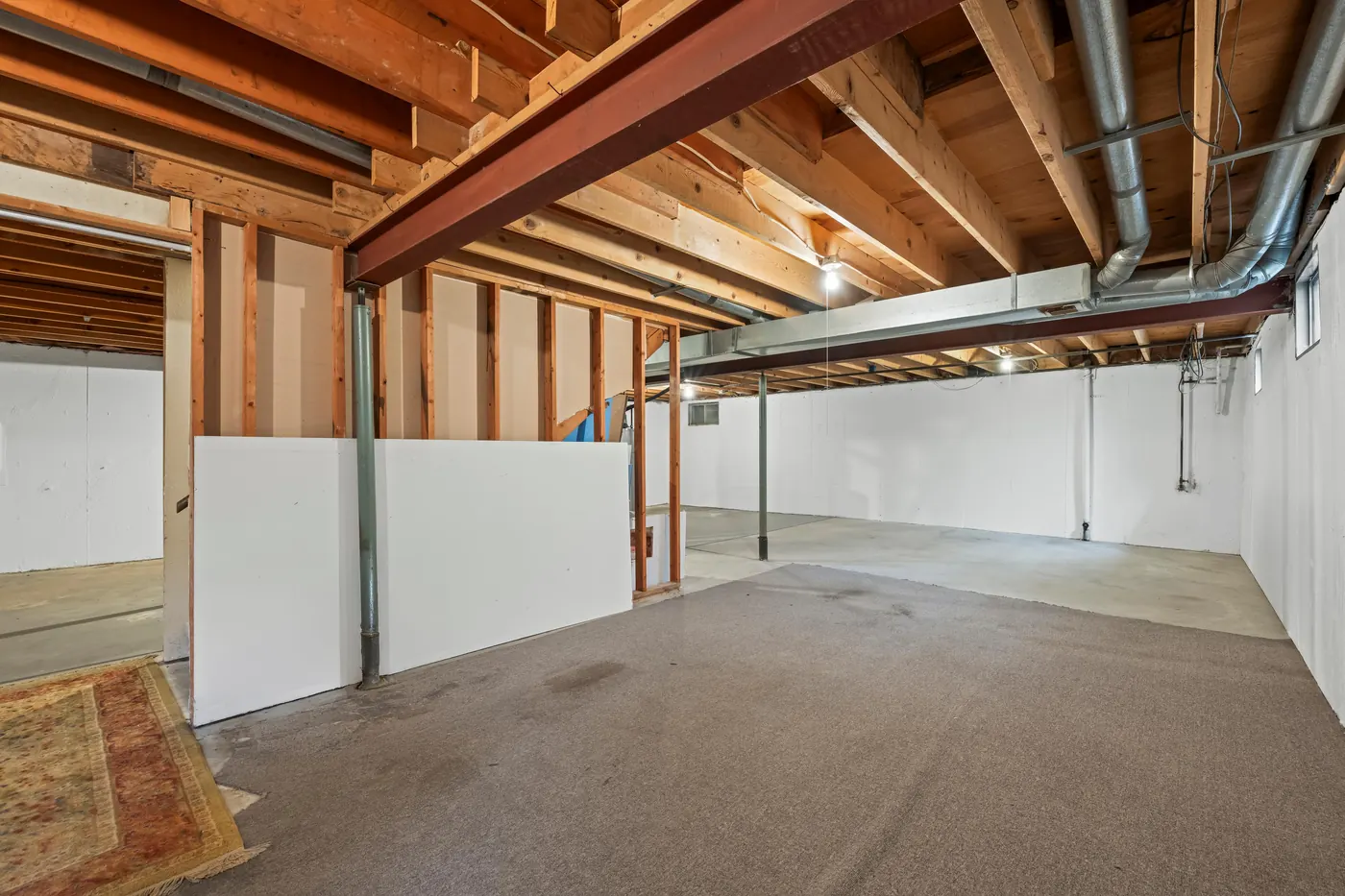 Unfinished 1,115 sq ft basement with plumbing rough-in for a future bath